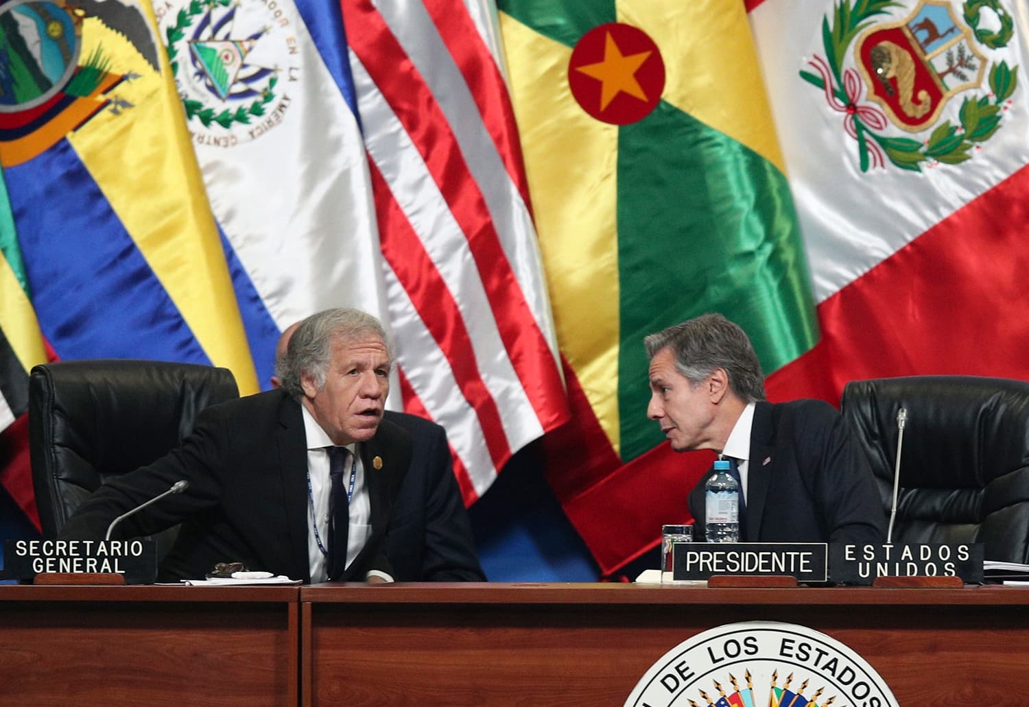 US Secretary of State Antony J. Blinken, right, talks with Secretary General of the Organization of American States (OAS) Luis Almagro at the 52nd OAS General Assembly in Lima, Peru, Thursday, October 6, 2022. (AP Photo/Guadalupe Pardo).
