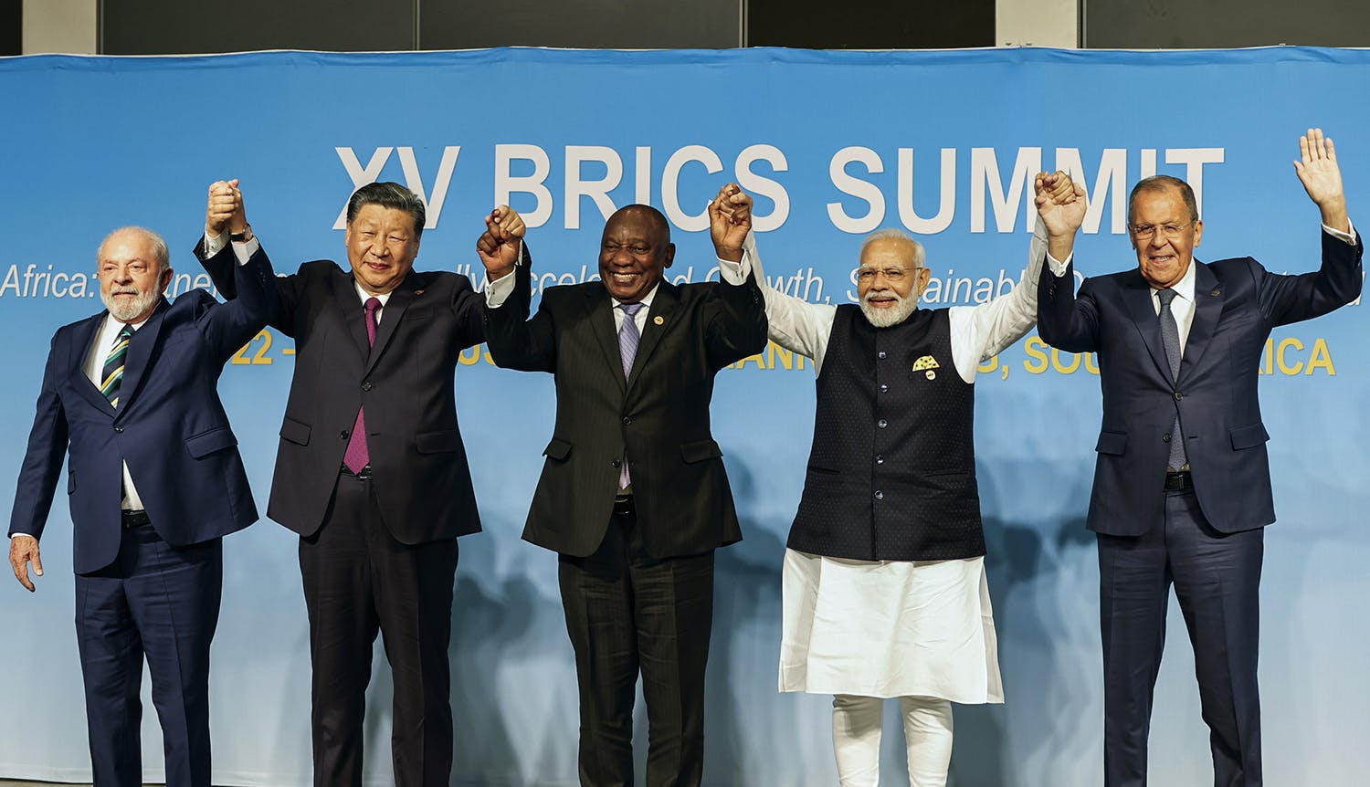 From left, Brazil's President Luiz Inacio Lula da Silva, China's President Xi Jinping, South Africa's President Cyril Ramaphosa, India's Prime Minister Narendra Modi and Russia's Foreign Minister Sergei Lavrov pose for a BRICS group photo during the 2023 BRICS Summit at the Sandton Convention Center in Johannesburg, South Africa, Wednesday, Aug. 23, 2023. (Gianluigi Guercia/Pool via AP)